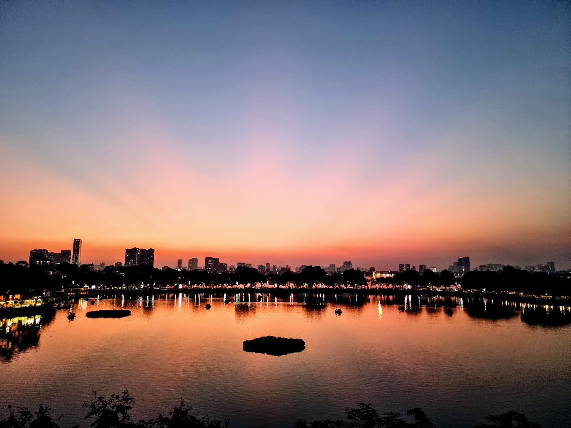 Double lake view from an elevated vantage point by Tran Vu street